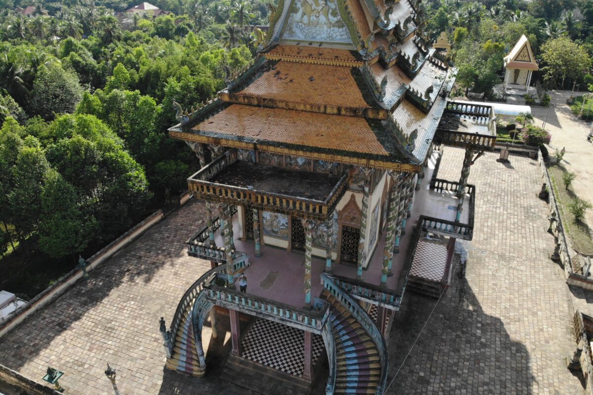 From the air: a tiered pagoda among the palms between Battambang and Pursat