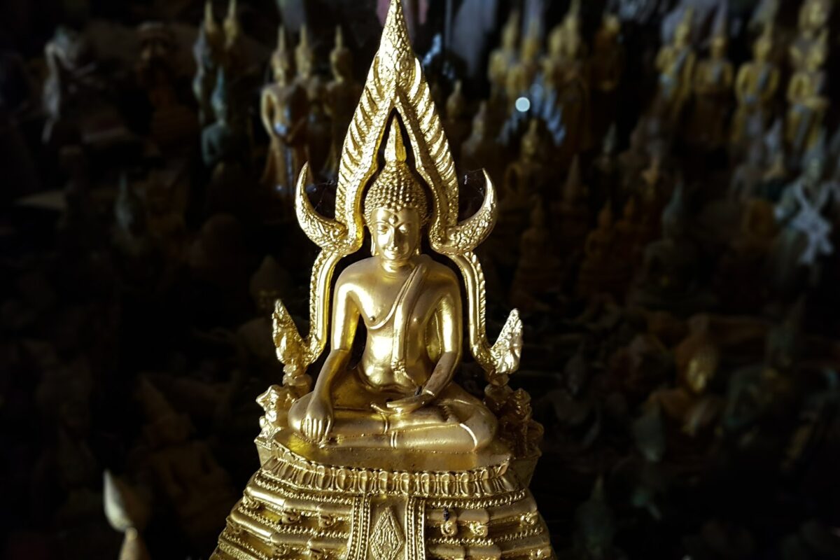 A gilded Buddha in the Pak Ou caves