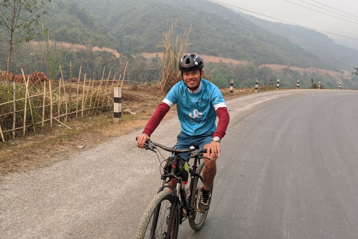 The Social Cycles guide on the mountain road near Muang Khua