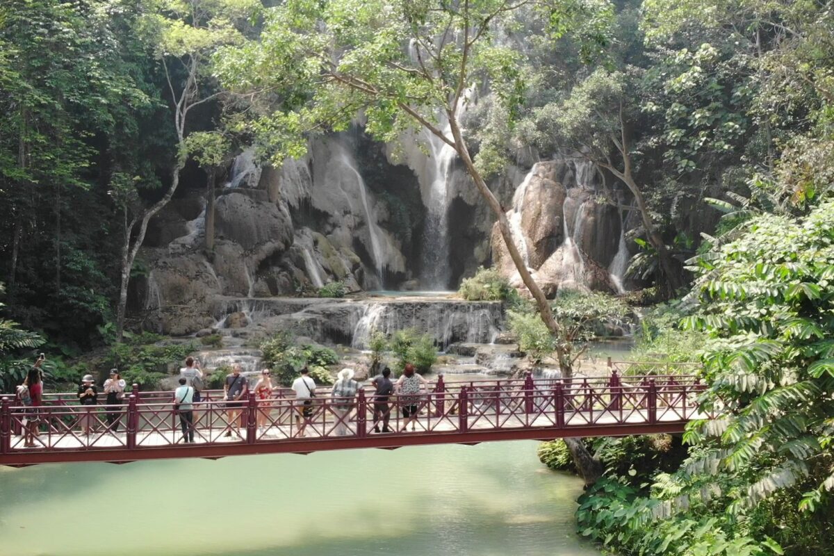 From the air over Kuang Si's jade pool to the main falls