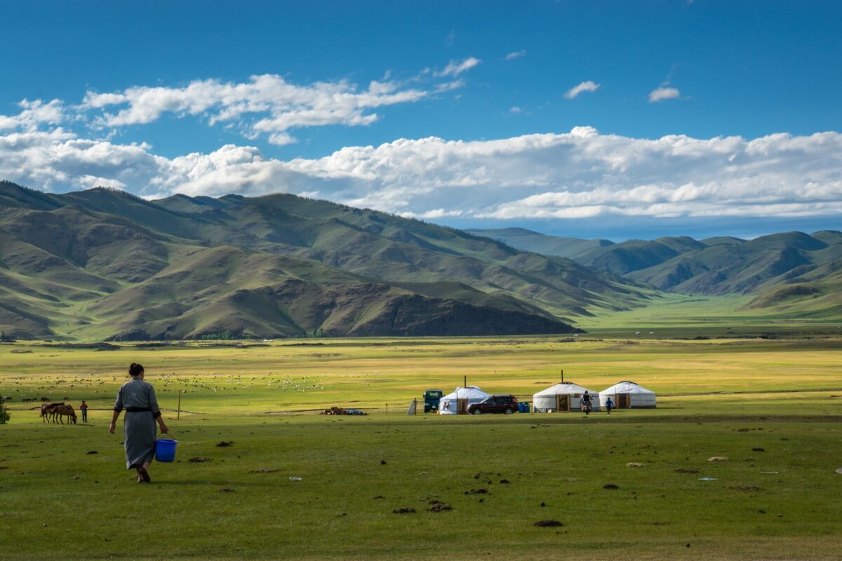 A herder walks home to the gers, Orkhon valley